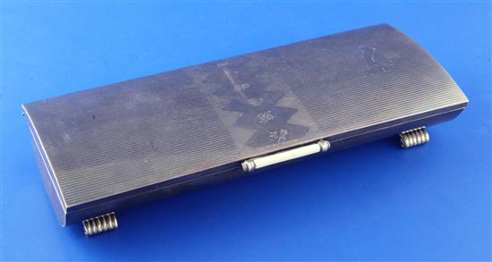 An early 1960s Art Deco style silver cigarette box, gross 24 oz.